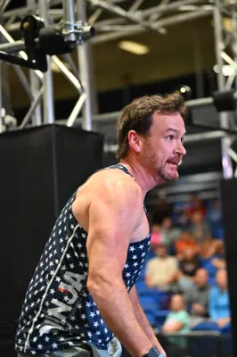 David Kiser in a NinjaFit tank, focused on the next obstacle