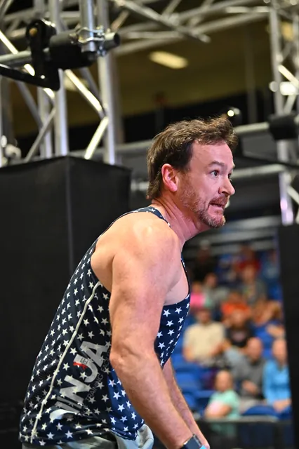 David Kiser in a NinjaFit tank, focused on the next obstacle