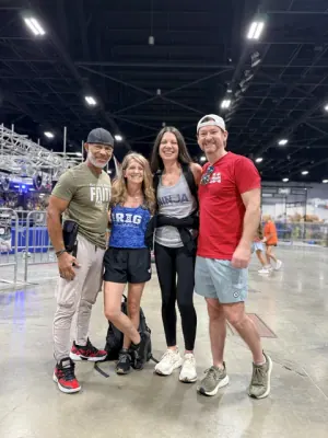 Glenn Davis, Melissa Davis, Ashley Kiser and David Kiser smiling together at a competition