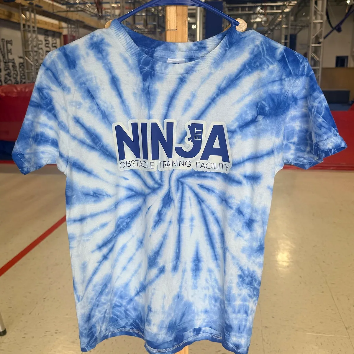 Blue tie-dye NinjaFit T-shirt, front